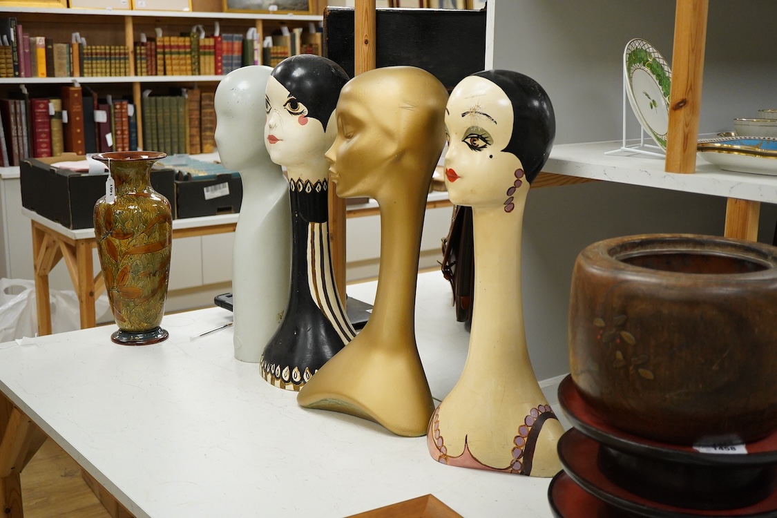 Two painted milliner’s hat display stands and two others, tallest 63cm high.
